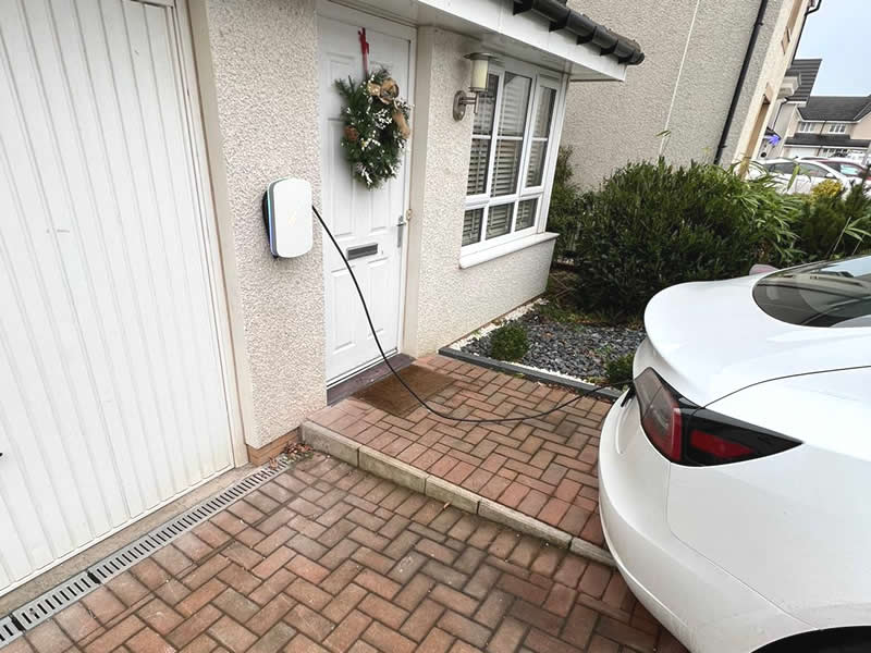 Car being charged with new home EV charger in Edinburgh